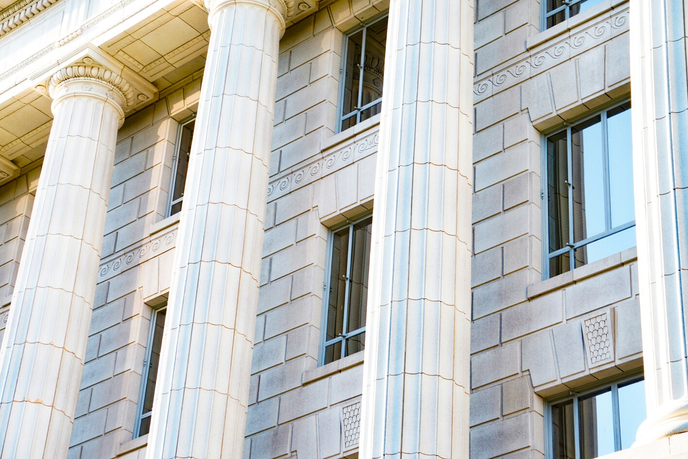 White marble columns and windows on a building